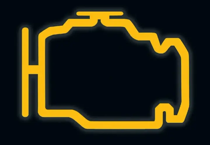 Żółty symbol silnika na czarnym tle. Oznacza problem z silnikiem, być może słabe paliwo. Check engine świeci.
